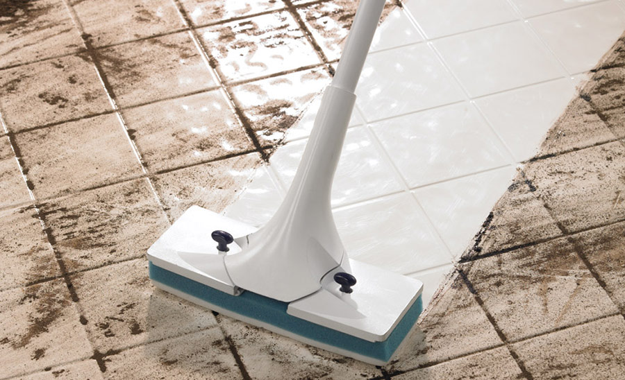 cleaning dirty floor tiles